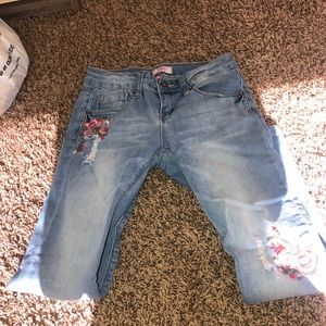 light wash girl jeans with flower patches